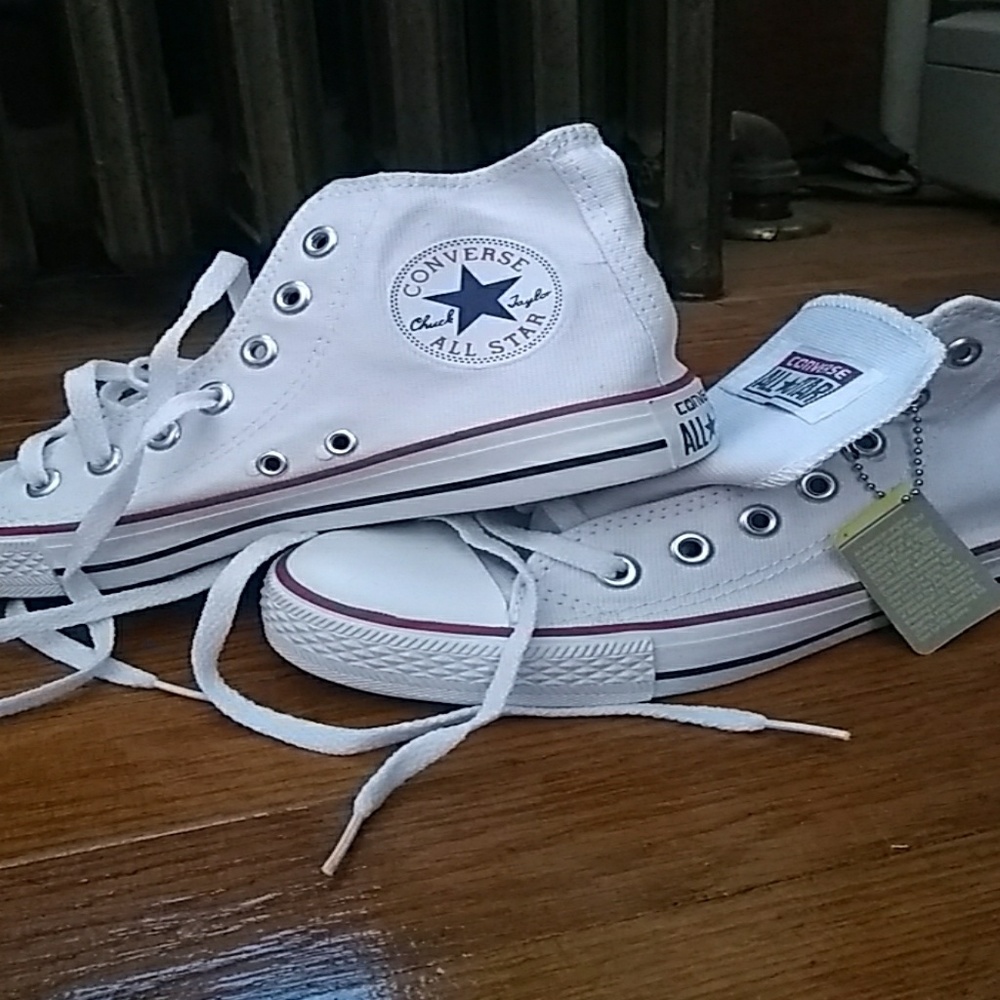 White Chuck Taylor Converse high top shoes